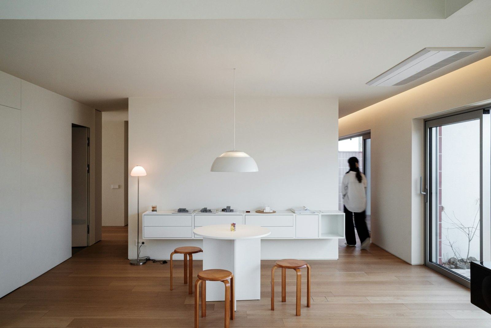 A light-filled commercial interior with coordinated furniture and finishes